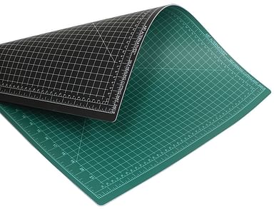 9 x 12 Green/Black Cutting Mat @ Raw Materials Art Supplies